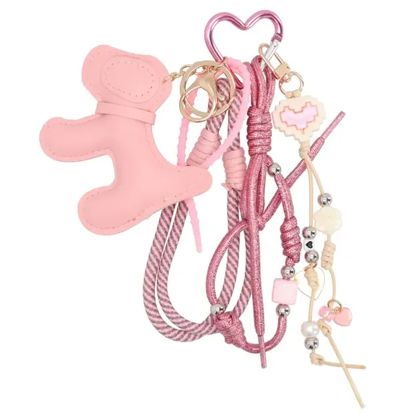 No Label Trendy charm pink med dekorative snore, perler og vedh�ng